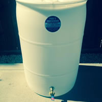 WATER HARVESTING RAINBARREL WITH SINGLE OR DOUBLE TAP